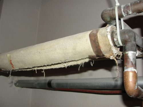 Cold water piping wrapped with possible asbestos material
