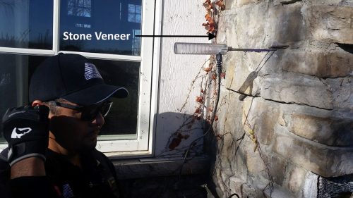 Stone veneer moisture testing