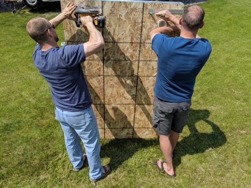 Joe and Matt building a wall