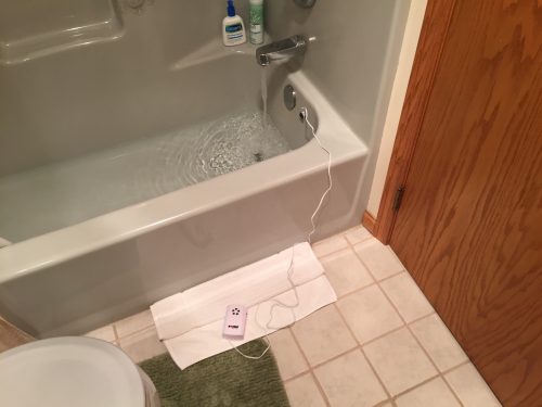 Bathtub overflow sensor