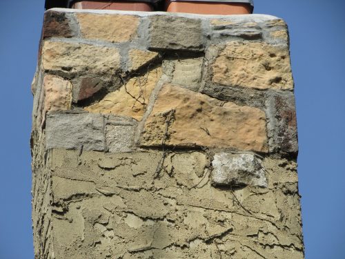 Stucco-covered chimney 1