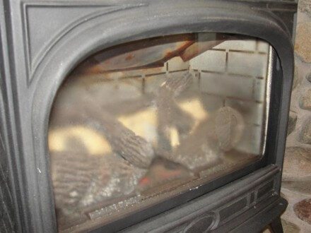 Condensation at glass on gas fireplace