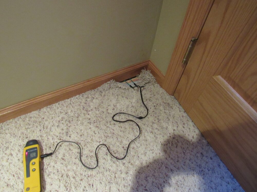 Moisture testing wood foundation.JPG