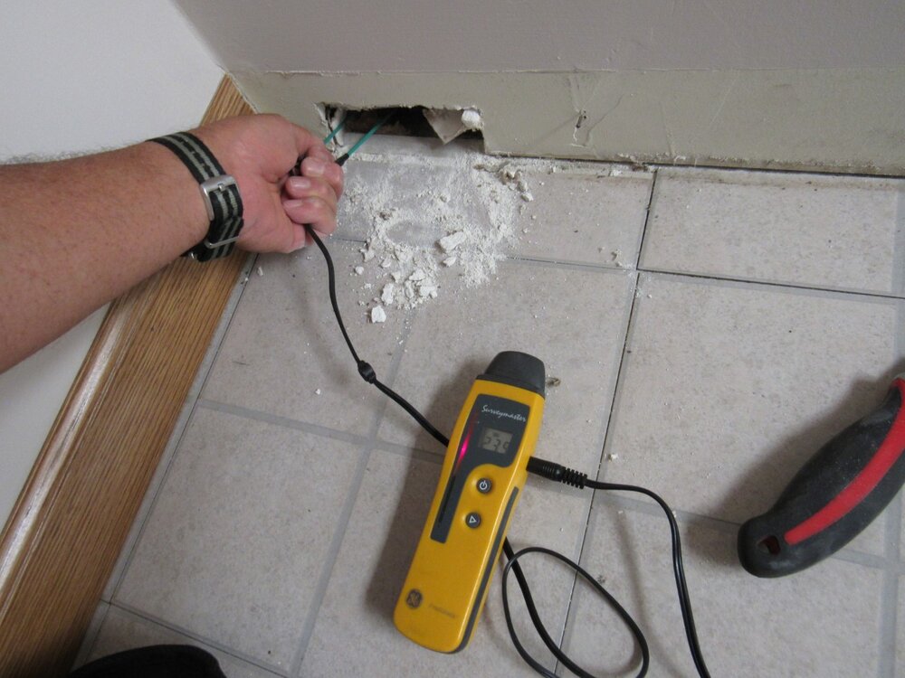 Moisture testing wood foundation 3.JPG