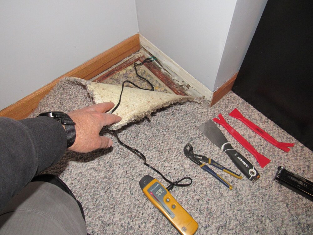 Moisture testing wood foundation before.JPG