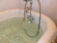Bath tub overflow
