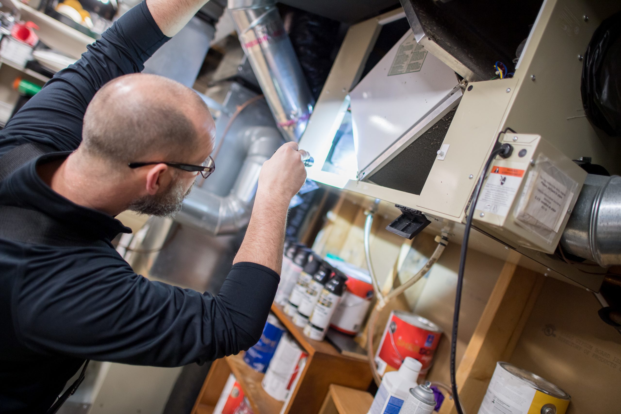 O.B.A home inspector reviewing findings and preparing same-day inspection report
