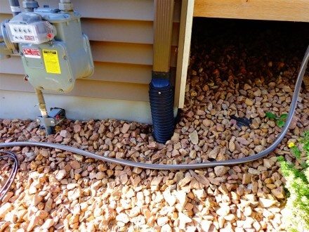 Exterior - downspout connected directly to yard drain