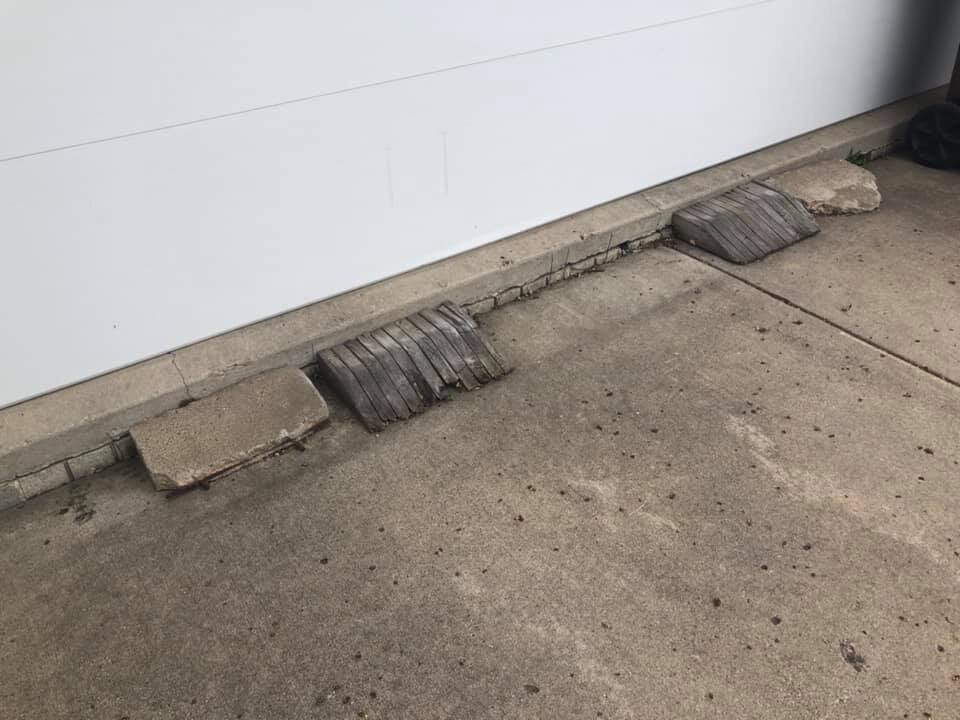 Quite the interesting solution to a settled driveway. And when we Minnesotans say “interesting”, we don’t mean interesting.