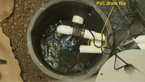 PVC drain tile in sump basket