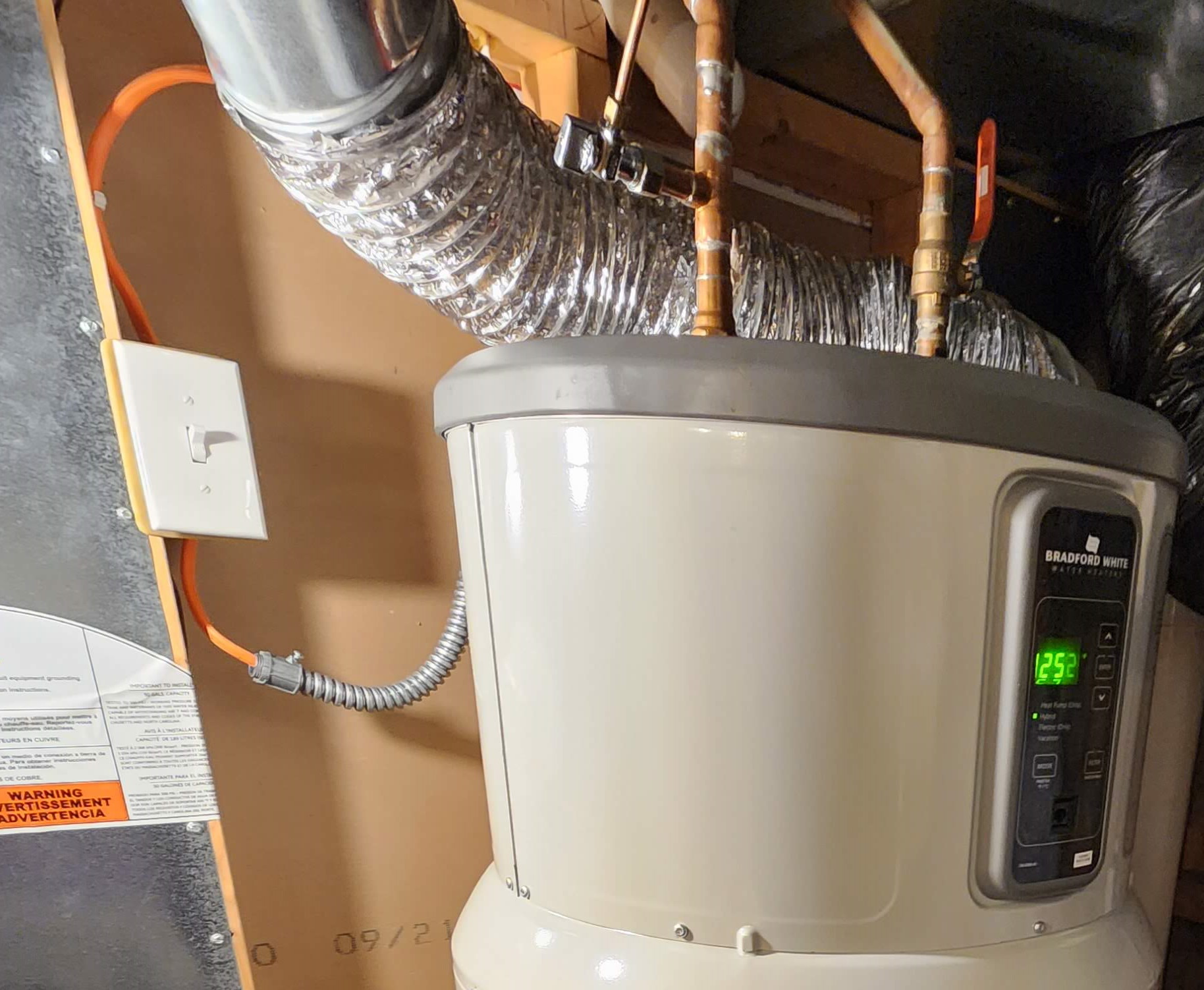 Inspecting the wiring to an electric water heater - Structure Tech Home  Inspections
