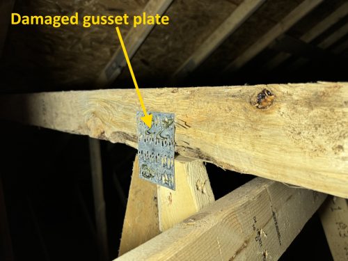 Damaged gusset plate marked up