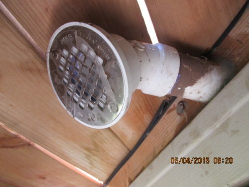 Furnace vent with shower drain