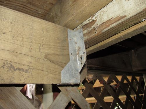 Hanging joist hanger