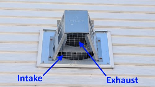 Gas fireplace intake and exhaust