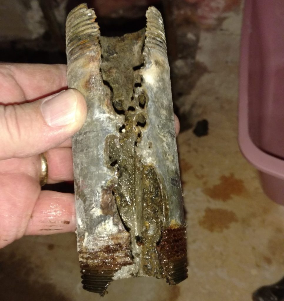 Corroded steel drain